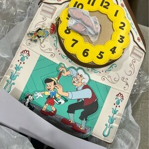 NWT Loungefly WonderCon Exclusive - Pinocchio Cuckoo Clock Mini Backpack